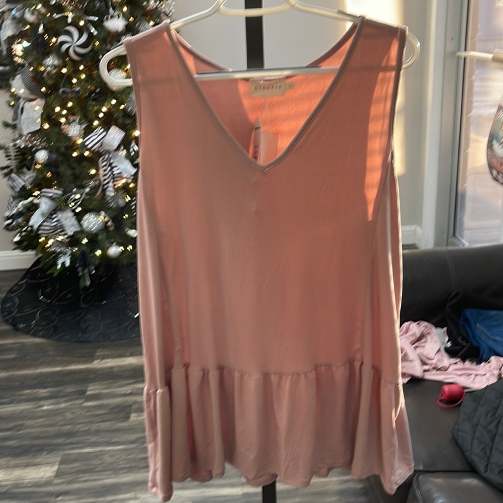 Light pink tank top. Brand new!